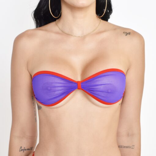 Model showcasing the Sunset Veil Bandeau Bikini Top with Violet Mesh and Red Straps