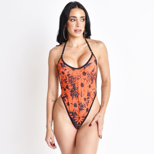 Model Showcasing the Sunset Waves Swimsuit, made from Orange and Deep Blue Mesh Fabric