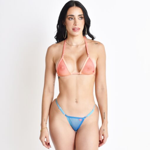 Model showcasing the Tropic Haze Sheer Bikini light melon and light blue print