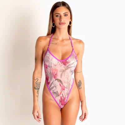 Front view of light pink sheer floral swimsuit with violet trim, high-leg halter.