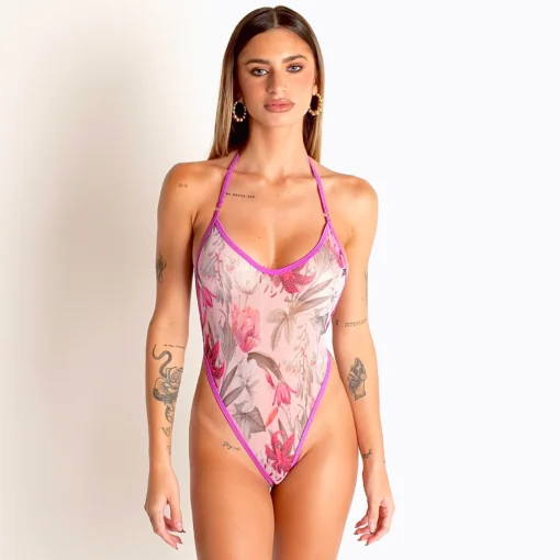 Front view of light pink sheer floral swimsuit with violet trim, high-leg halter.